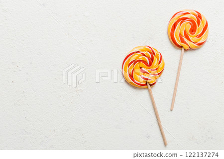 Set of colorful lollipops on colored background. Summer concept. Party Happy Birthday or Minimalist Concept 122137274