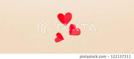 Valentine day background with red hearts, top view with copy space Valentine day background with red hearts, top view with copy space 122137311