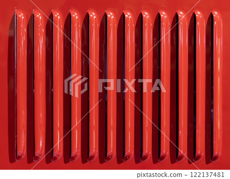 Red car grille with vertical slats closeup view Red car grille with vertical slats closeup view 122137481