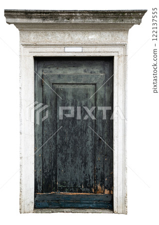 Aged wooden door surrounded by marble frame Aged wooden door surrounded by marble frame 122137555