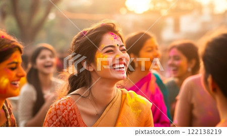 Tourists join the vibrant Holi festivities, dressed in colorful sarees and churidars Tourists join the vibrant Holi festivities, dressed in colorful sarees and churidars 122138219