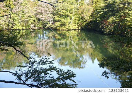The mysterious lake surface and reflections seen from the walking course in Tsugaru Juniko Natural Recreation Forest 122138631