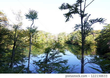 The mysterious lake surface as seen from the walking trail in Tsugaru Juniko Natural Recreation Forest 122138633