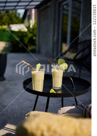 Creamy Lime Cocktail with Condensed Milk in a Refreshing Tropical Style Creamy Lime Cocktail with Condensed Milk in a Refreshing Tropical Style 122138815