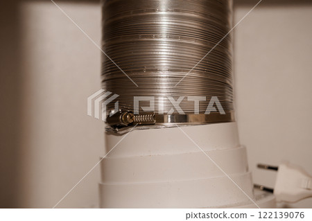 Close-Up of a Silver Duct Hose and Connector Fastener 122139076