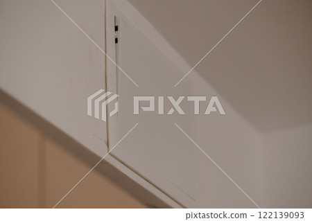 Concealed Access Panel in a Modern Interior Corner 122139093