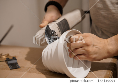 Crafting a Modern Ceramic Bowl with a Power Tool Crafting a Modern Ceramic Bowl with a Power Tool 122139094