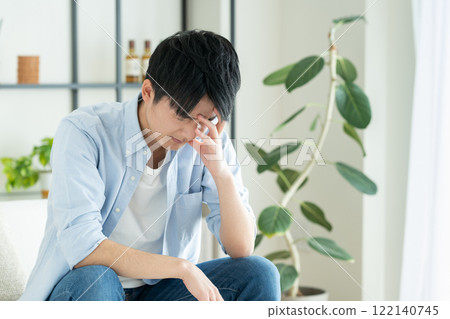 Worried young man 122140745