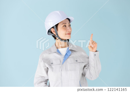 Woman, work clothes, helmet, pointing 122141165