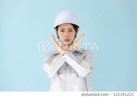 Woman, work clothes, helmet, cross 122141225