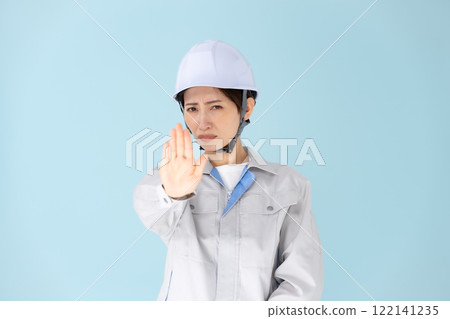 Women, work clothes, helmets, not allowed Women, work clothes, helmets, not allowed 122141235