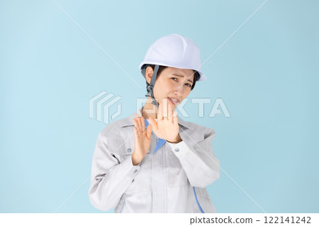 Women, work clothes, helmets, not allowed Women, work clothes, helmets, not allowed 122141242