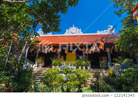 View of Tu Ton Pagoda in Nha Trang. Buddhist temple on an island in the middle of the sea View of Tu Ton Pagoda in Nha Trang. Buddhist temple on an island in the middle of the sea 122141343
