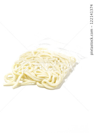 Udon noodles in a bag before boiling, photographed against a white background Udon noodles in a bag before boiling, photographed against a white background 122141374