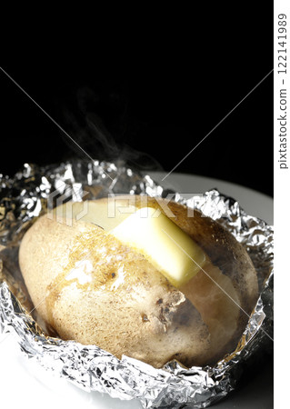 Hot and steaming potatoes with butter Hot and steaming potatoes with butter 122141989