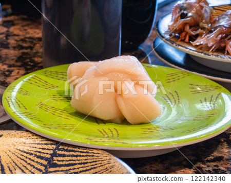 Japanese nigiri sushi. Fresh scallops and vinegared rice sushi. 122142340