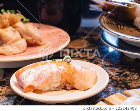Japanese nigiri sushi. Fresh fatty salmon and vinegared rice sushi. Japanese nigiri sushi. Fresh fatty salmon and vinegared rice sushi. 122142408