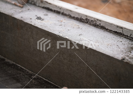 Construction of pile-grillage foundation. Monolithic foundation with metal reinforcement. Monolithic concrete foundation. House construction 122143385