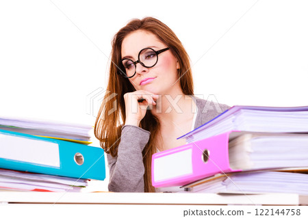 woman tired with stack of folders documents woman tired with stack of folders documents 122144758