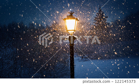 Street lights illuminating heavy snowfall 122145373