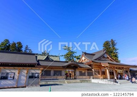 View of the tower gate at Aso Shrine, one of Japan's three largest tower gates. "Restoration completed after eight years of extensive damage in the Kumamoto earthquake" (Aso City) 122145794