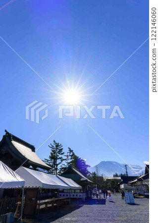 The grounds of Aso Shrine, one of Japan's three largest tower gates, with Mount Aso in the background. "Restoration completed eight years after extensive damage in the Kumamoto earthquake" (Aso City) 122146060