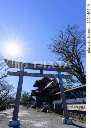 Torii gate scenery at Aso Shrine, one of Japan's three largest tower gates. "Restoration completed after eight years of extensive damage from the Kumamoto earthquake" (Aso City) 122146549