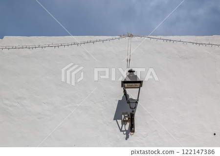 White wall with a lantern, Teguise, Lanzarote, Spain 122147386