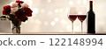 Valentines banner, bokeh background, bottle of red wine, wine glass, bouquet of red roses, empty space. Template for Valentine's Day menu advertisements, anniversaries, celebrations, mock up. 122148994