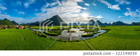 Aerial drone view panorama of Bac Son rice field valley at sunset, Lang Son, Vietnam Aerial drone view panorama of Bac Son rice field valley at sunset, Lang Son, Vietnam 122149039