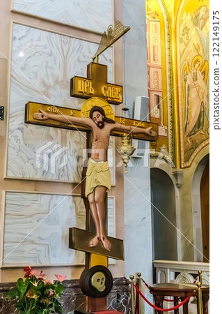 Belgrade, Serbia- 10162024: The Temple Of Saint Sava indoor interior, people pray in an Orthodox church, frescoes on the ceilings and walls of the church Belgrade, Serbia- 10162024: The Temple Of Saint Sava indoor interior, people pray in an Orthodox church, frescoes on the ceilings and walls of the church 122149175