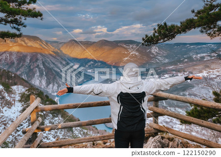 Woman Looking Sunrise on Banjska Stena Viewpoint Woman Looking Sunrise on Banjska Stena Viewpoint 122150290