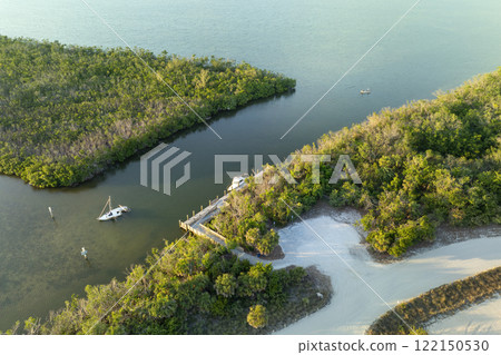 Capsized sunken sailing boat left forsaken on shallow bay waters after hurricane Ian in Manasota, Florida Capsized sunken sailing boat left forsaken on shallow bay waters after hurricane Ian in Manasota, Florida 122150530