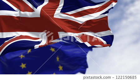 Flags of United Kingdom and the European Union waving in the wind 122150685