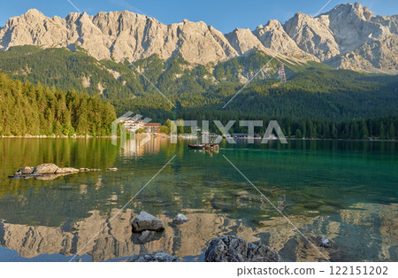 Scenic View of Eibsee Lake with Zugspitze Mountain at Sunset in Bavaria, Germany. Stunning Eibsee Lake with Zugspitze Reflection at Sunset in Bavaria, Germany. Tranquil Alpine Scene Captures the 122151202
