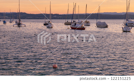 Bodensee Lake Sunset Panorama. Evening Sunlight Over Tranquil Waters. Sunset Vista at Lake Bodensee in Germany. 122151225