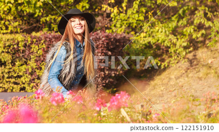 Cheerful woman having fun outdoors Cheerful woman having fun outdoors 122151910