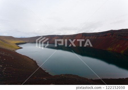 Volcanic crater with water near Landmannalaugar area, Iceland 122152030