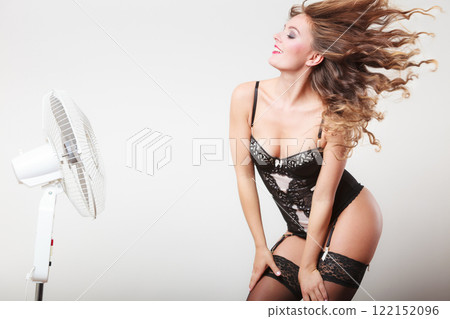 Woman with wind in hair Woman with wind in hair 122152096