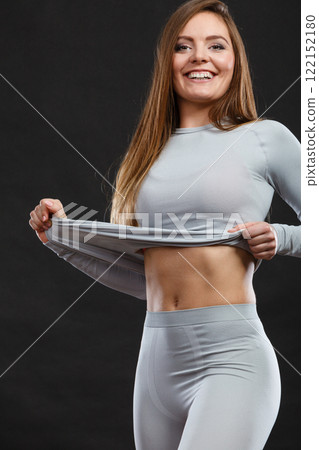 Sporty woman wearing thermoactive underwear. Sporty woman wearing thermoactive underwear. 122152180