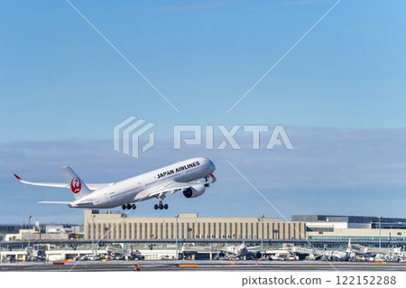 New Chitose Airport in winter, airplane taking off, Chitose, Hokkaido New Chitose Airport in winter, airplane taking off, Chitose, Hokkaido 122152288