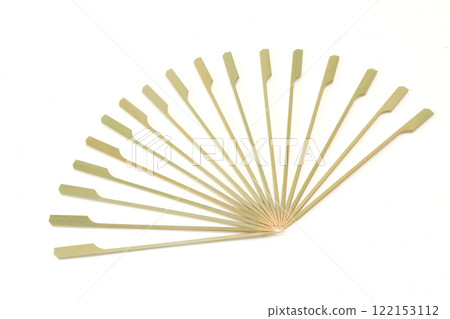 Bamboo skewers on white background Bamboo skewers on white background 122153112