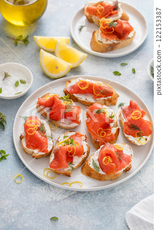 Smoked salmon crostini or bruschetta with cream cheese and lox 122153387