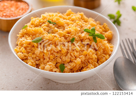 Cooked red lentils in a bowl, vegan protein source 122153414