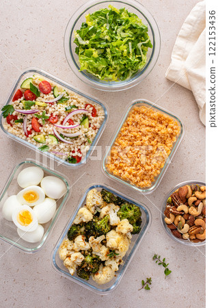 Vegetarian meal prep with eggs, lentils, roasted vegetables, nuts and salad 122153436