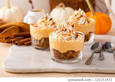 Pumpkin dessert in a cup, pudding or no bake cheesecake with spices and whipped cream Pumpkin dessert in a cup, pudding or no bake cheesecake with spices and whipped cream 122153472
