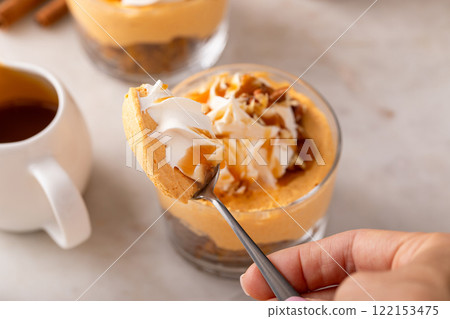 Pumpkin dessert in a cup, pudding or no bake cheesecake with spices and whipped cream Pumpkin dessert in a cup, pudding or no bake cheesecake with spices and whipped cream 122153475