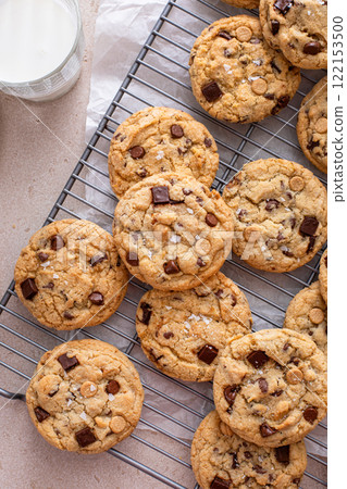 Fresh baked chocolate chip cookies on cooling rack 122153500