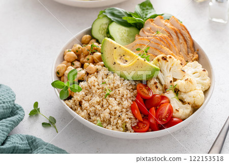 Healthy quinoa buddha bowl with grilled chicken 122153518