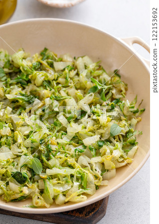 Fresh sauteed green vegetables in pan 122153692